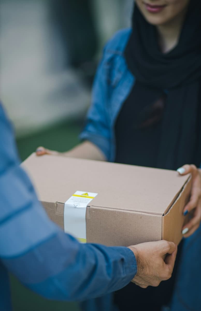 Online order parcel handed to a customer