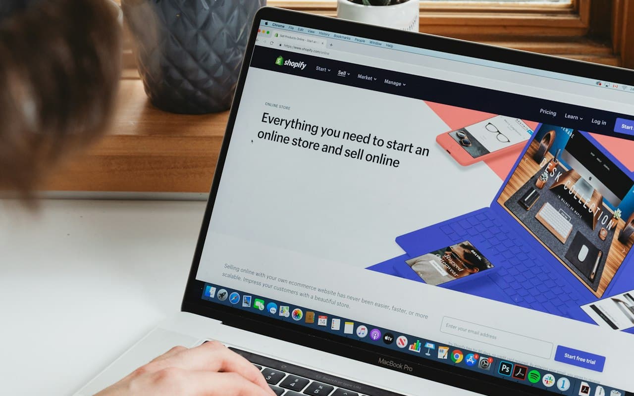 Online seller managing their store from a laptop