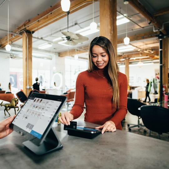 Customer paying by card at a retail checkout