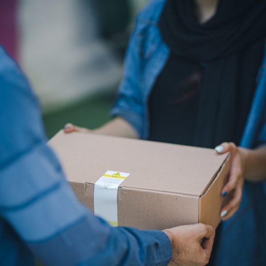 Online order parcel handed to a customer